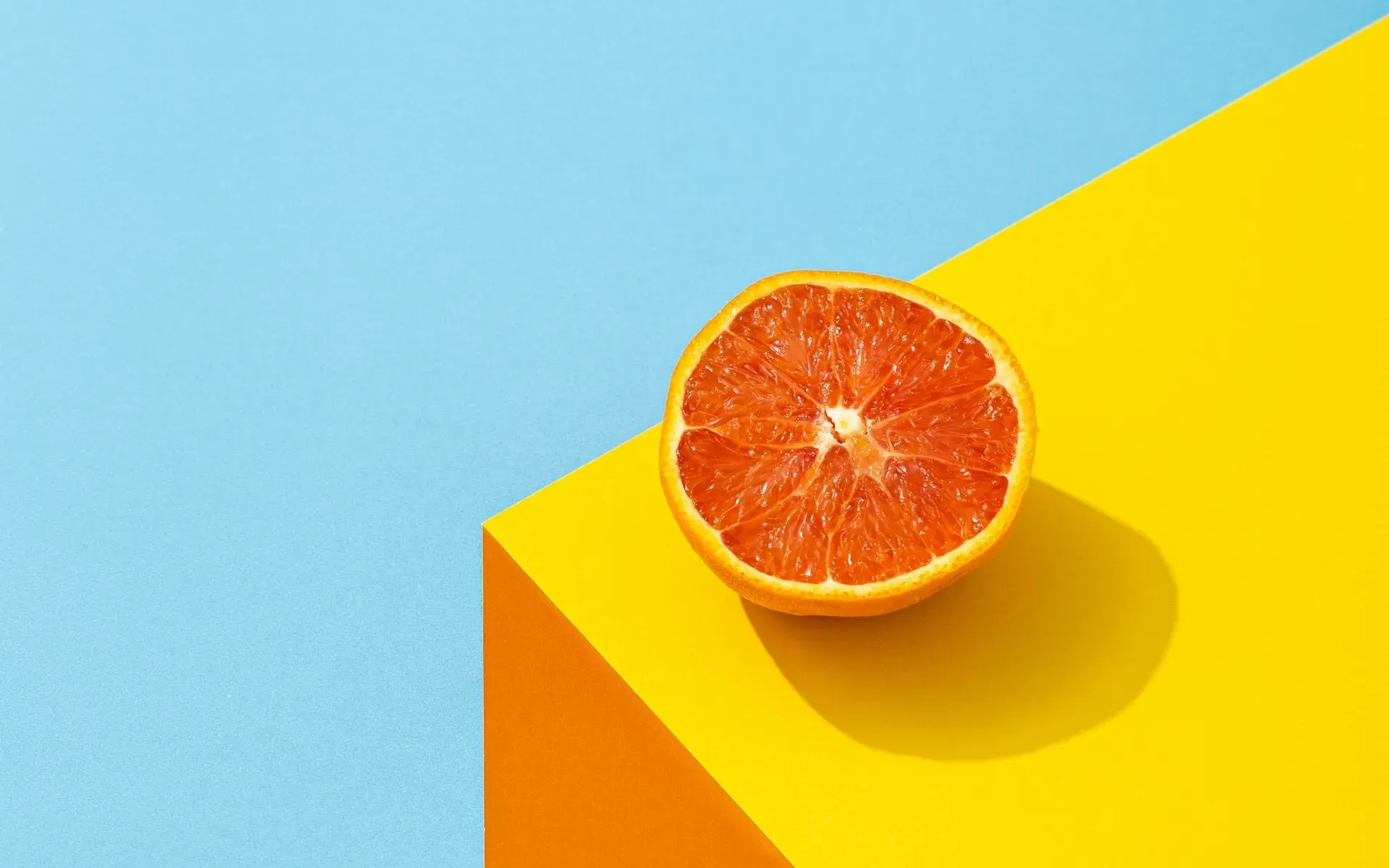 Blood orange on a ledge