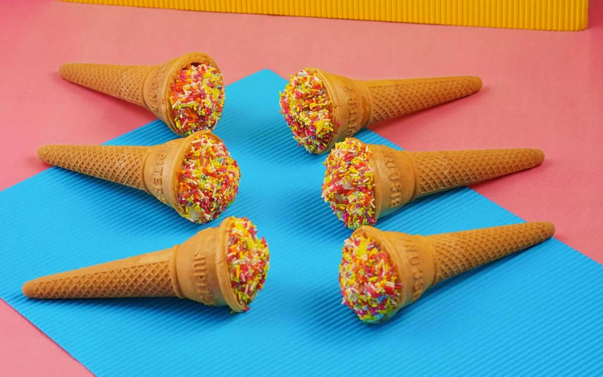 Rows of ice cream on a blanket 