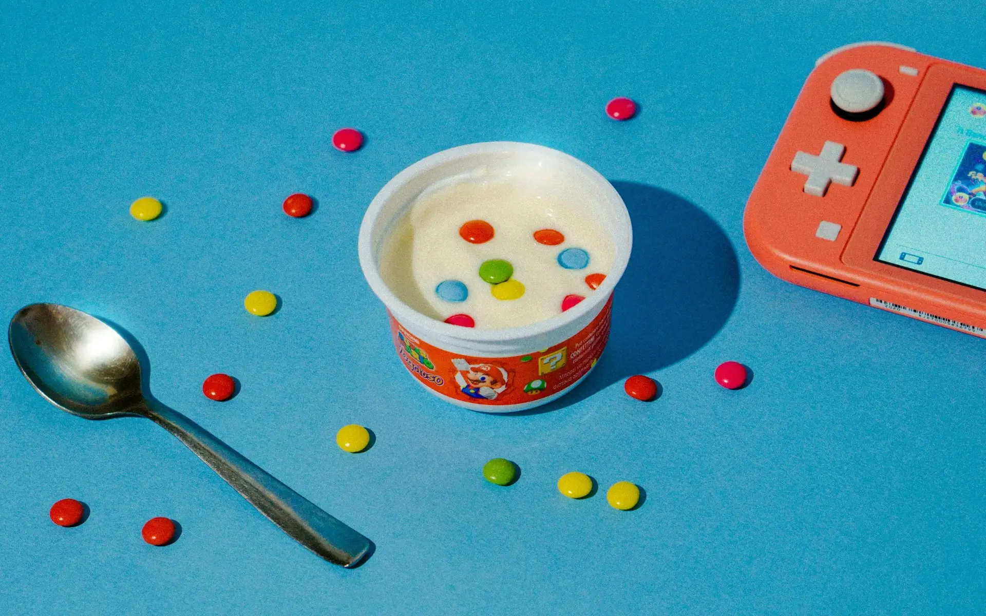 Mario yoghurt next to a Nintendo Switch
